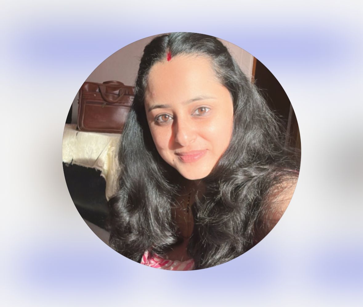 Dr. Kavya Iyer, Child Psychologist at NuroSpark — professional headshot in clinical setting